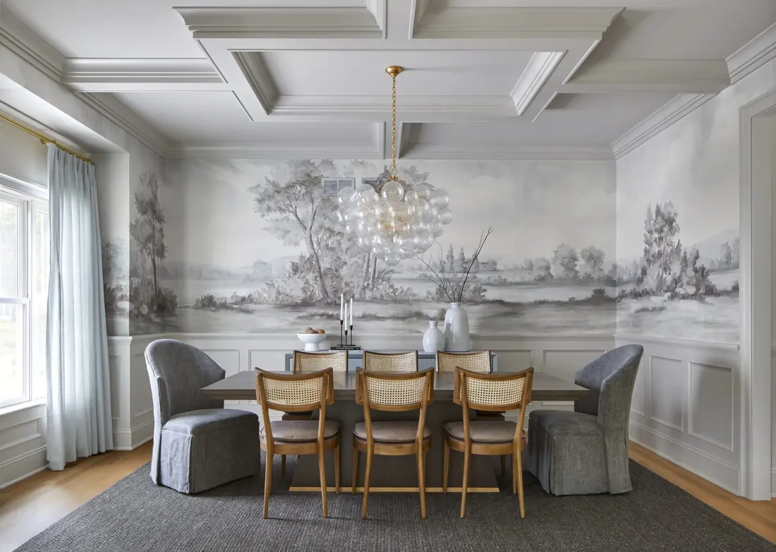 Chatham dining room with mural wallpaper, upholstered chairs and a sculptural chandelier by Ellie Mroz Design