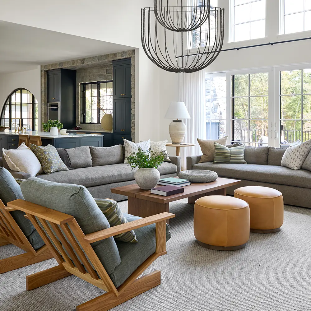 A furnished family room with a metal chandelier in a New Jersey home renovation